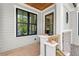Charming front porch with black windows and wood flooring at 3794 Wynn Walk, Brookhaven, GA 30341