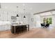 Open concept kitchen with large island and breakfast area at 3794 Wynn Walk, Brookhaven, GA 30341