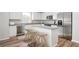 Modern kitchen with stainless steel appliances and island at 356 Rock View Ln, Covington, GA 30016
