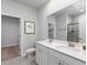 Modern bathroom with double vanity, and a large walk-in shower at 356 Rock View Ln, Covington, GA 30016