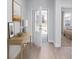 Light and airy entryway with wood-look flooring and open floor plan at 356 Rock View Ln, Covington, GA 30016