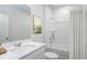 Clean bathroom with a bathtub and shower combination at 356 Rock View Ln, Covington, GA 30016