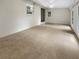 Spacious living room with carpeted floors and lots of natural light at 828 Pinevalley Dr, Forest Park, GA 30297