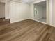 Bright bedroom featuring wood-look flooring and ample natural light at 828 Pinevalley Dr, Forest Park, GA 30297