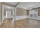 Bright dining room with hardwood floors and chandelier at 3401 Ravensworth Nw Trce, Kennesaw, GA 30144