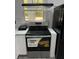 Stainless steel range with air fryer and overhead vent at 3775 Clairmont Rd, Chamblee, GA 30341