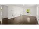 Bright living room featuring hardwood floors and lots of natural light at 3775 Clairmont Rd, Chamblee, GA 30341