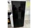 Black refrigerator in the kitchen at 3775 Clairmont Rd, Chamblee, GA 30341