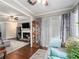 Bright living room with hardwood floors and a view of the fireplace at 804 Vicksburg Pl, Atlanta, GA 30350