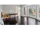 Home office with built-in desk and hardwood floors at 3047 Players Dr, Jonesboro, GA 30236