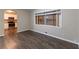 Spacious living room with dark gray vinyl flooring and a view into the kitchen at 2648 Cavalier Dr, Decatur, GA 30034