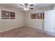 Well-lit bedroom with ceiling fan and carpet flooring at 2648 Cavalier Dr, Decatur, GA 30034