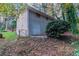 Side view of house needing repairs at 2648 Cavalier Dr, Decatur, GA 30034
