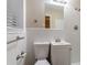 Updated bathroom with white tile and new fixtures at 2648 Cavalier Dr, Decatur, GA 30034