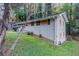 Ranch home with a brick exterior, nestled on a grassy lot with mature trees at 2648 Cavalier Dr, Decatur, GA 30034