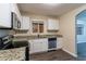 Modern kitchen with granite countertops and stainless steel appliances at 2648 Cavalier Dr, Decatur, GA 30034