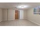 Unfinished basement area with sliding door at 2648 Cavalier Dr, Decatur, GA 30034