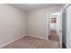 Bedroom with carpet flooring and access to bathroom at 2648 Cavalier Dr, Decatur, GA 30034