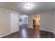 Open concept living space with vinyl flooring and access to kitchen and bedroom at 2648 Cavalier Dr, Decatur, GA 30034