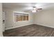 Bright living room with vinyl flooring and ceiling fan at 2648 Cavalier Dr, Decatur, GA 30034