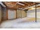 Unfinished basement with high ceilings and ample storage space at 117 Neal Ave, Stockbridge, GA 30281