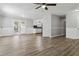 Bright living room with hardwood floors and access to back deck at 117 Neal Ave, Stockbridge, GA 30281
