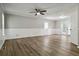 Open living room featuring hardwood floors and lots of natural light at 117 Neal Ave, Stockbridge, GA 30281