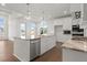 Modern kitchen with island, stainless steel appliances, and granite countertops at 2635 Yellowstone Farm Dr, Cumming, GA 30028