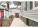 Side yard with concrete pathway leading to storage shed at 1257 Lyle Nw Pl, Atlanta, GA 30318