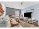 Cozy living room featuring a large sectional sofa and flat-screen TV at 406 Elm Nw St, Atlanta, GA 30314