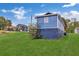Another view of the back of the blue house and yard at 406 Elm Nw St, Atlanta, GA 30314