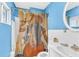Bathroom with a shower/tub and unique shower curtain at 406 Elm Nw St, Atlanta, GA 30314