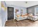 Bright living room with large windows and L-shaped sofa at 406 Elm Nw St, Atlanta, GA 30314