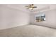 Spacious bedroom with ceiling fan and window at 106 Hampton Cir # 2, Mcdonough, GA 30253