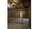 Unfinished basement with framed walls and exposed ceiling beams at 6526 Revena Ct, Austell, GA 30168