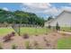 Fenced dog park with landscaping at 108 Redford Lane, Canton, GA 30115