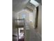 Unfinished upper level features skylights and walk-through access to a closet at 2234 Bolton Nw Rd, Atlanta, GA 30318