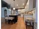 Kitchen with island, granite countertops, and hardwood floors at 2698 Claredon Nw Trce, Kennesaw, GA 30144