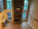 Two story Gathering room with stone fireplace and hardwood floors at 2698 Claredon Nw Trce, Kennesaw, GA 30144