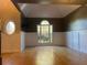 Bright living room with hardwood floors and large window at 2698 Claredon Nw Trce, Kennesaw, GA 30144