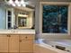 Bathroom boasts a large soaking tub and double vanity at 2698 Claredon Nw Trce, Kennesaw, GA 30144