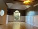 Spacious dining room with hardwood floors, wainscoting, and a large window at 2698 Claredon Nw Trce, Kennesaw, GA 30144