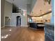 Open kitchen with island and view into great room at 2698 Claredon Nw Trce, Kennesaw, GA 30144