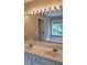 Bathroom with double vanity and large mirror at 3617 Elkhorn Ct., Duluth, GA 30096