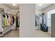 Large walk-in closet with double hanging rods and shelving at 3333 Castleberry Village Cir, Cumming, GA 30040