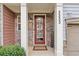 Inviting front entry with stone accents and double doors at 3333 Castleberry Village Cir, Cumming, GA 30040