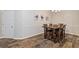Bright dining room with wood table, chairs, and hardwood floors at 3333 Castleberry Village Cir, Cumming, GA 30040