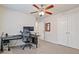 Home office with ceiling fan and double door closet at 3333 Castleberry Village Cir, Cumming, GA 30040