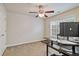 Spacious bedroom with ceiling fan and carpeted floors at 3333 Castleberry Village Cir, Cumming, GA 30040