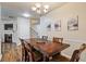 Spacious dining area with hardwood floors and a chandelier at 3333 Castleberry Village Cir, Cumming, GA 30040